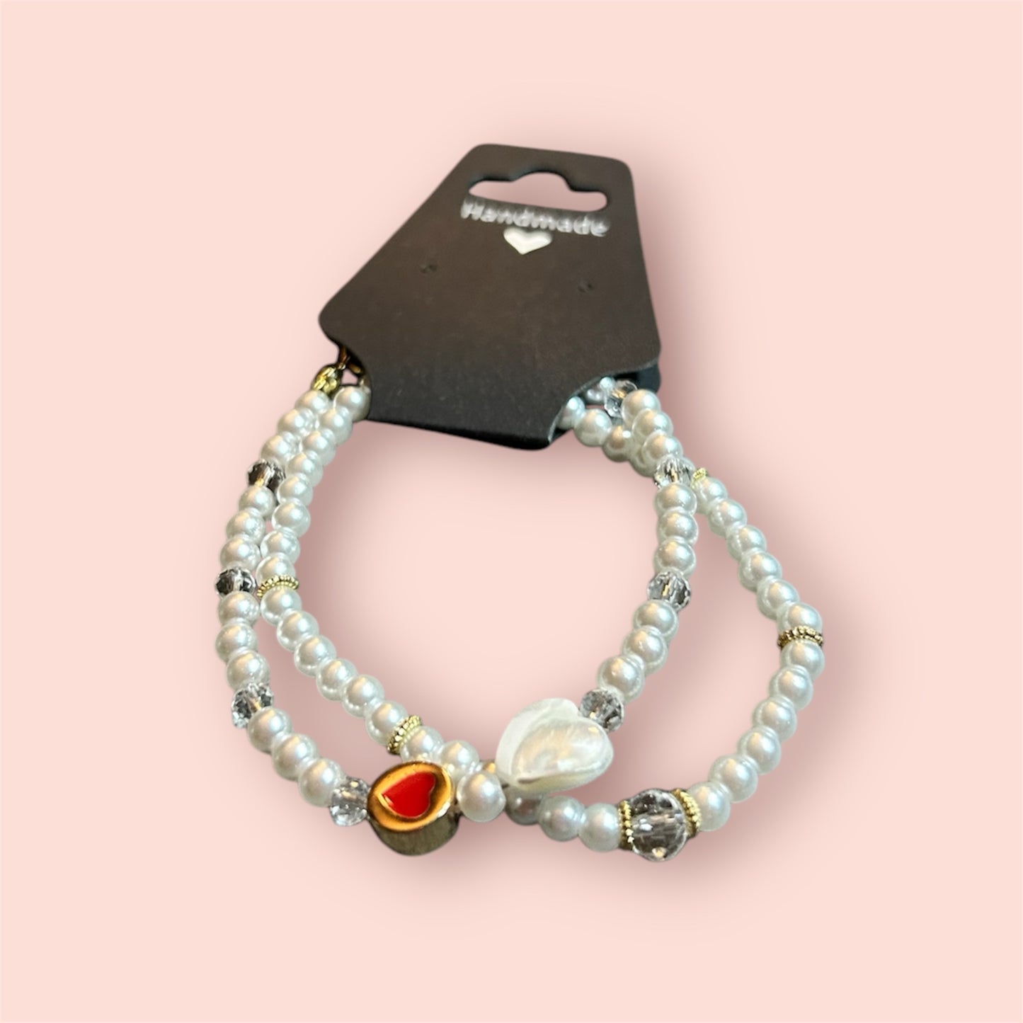 Pearl Bracelet with Heart Pendants